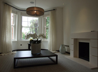 Fairhazel Gardens: Window and fireplace